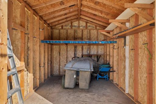 The backyard also includes a 12x10 shed for additional storage.