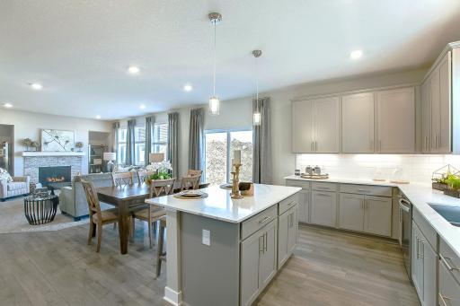 Open floor plan and tons of windows to let in the natural light. *Photos of a similar home. Colors and options will vary.