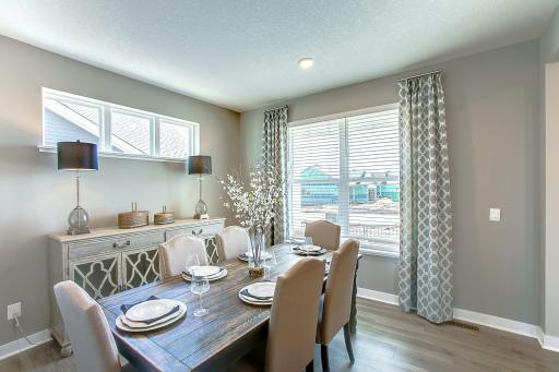 Formal dining room in the front of the home. *Photos of a similar home. Colors and options will vary.