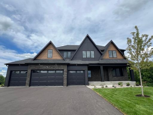 This custom Sutton Sport is a stunning home! Complimented by the beautiful homesite overlooking the Crow River. This home sold before print.