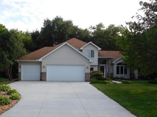 Welcome home! Brand new concrete driveway and garage door and openers.