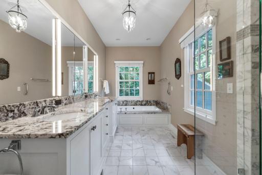 Primary bath double sinks and separate shower and tub
