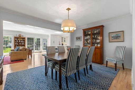 The dining room opens to the family room and kitchen
