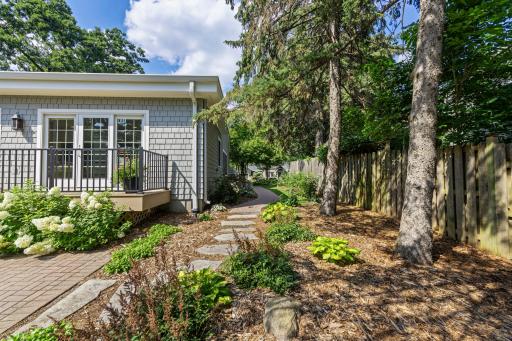 The beautiful gardens extend to the side yard