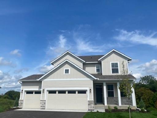 Lovely New 4 bedroom home and main floor office! Charming front porch for your rocking chairs or Adirondack chairs! Huge 3-car garage! New Home Warranties! Unfinished basement with Walkout!