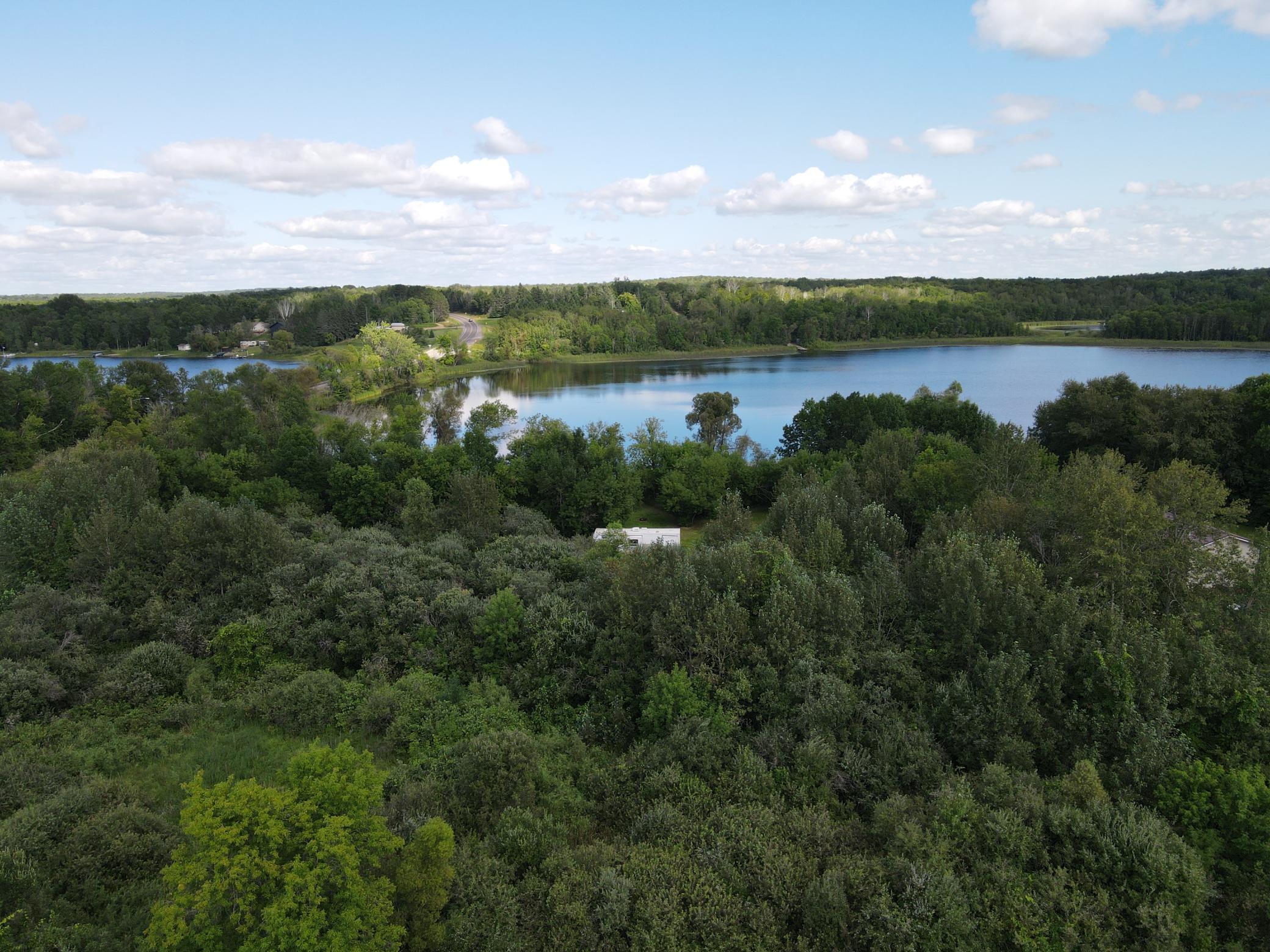 Wooded lot overlooking Hill Lake