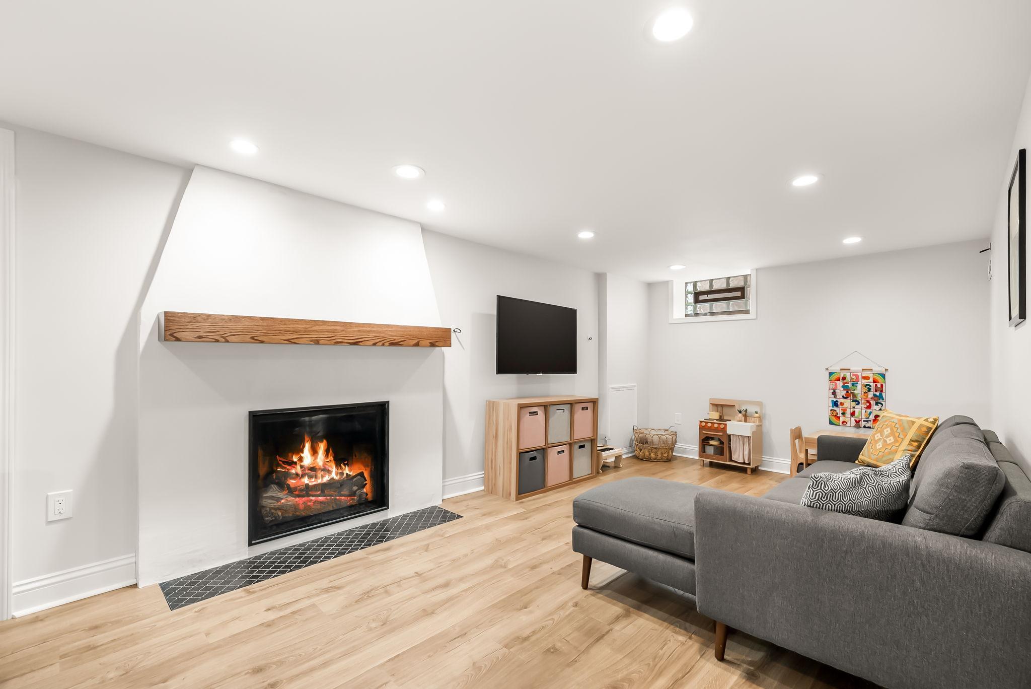 In the lower level you'll find an additional family room with a gas fireplace.