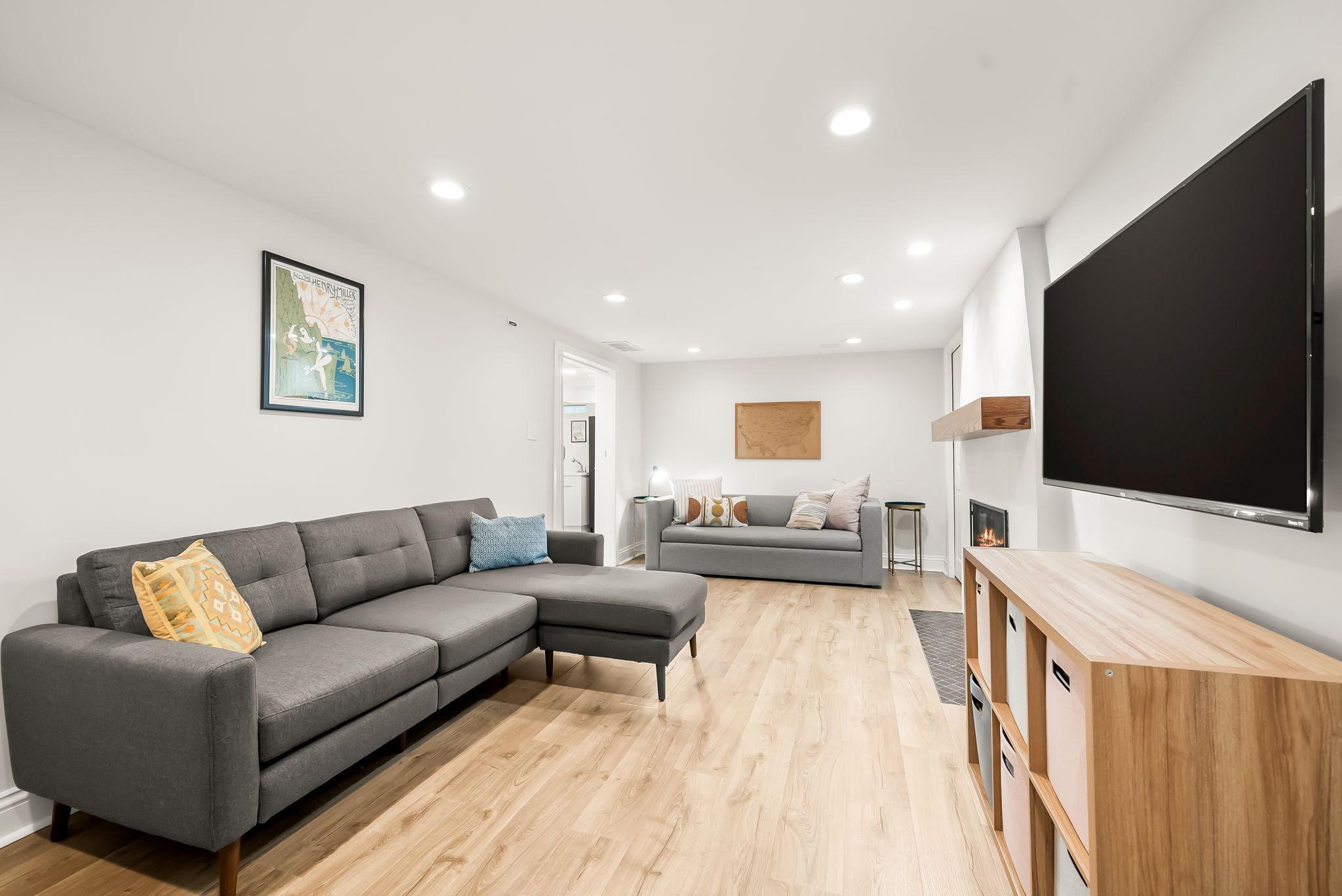 Alternate view of the spacious lower level family room.