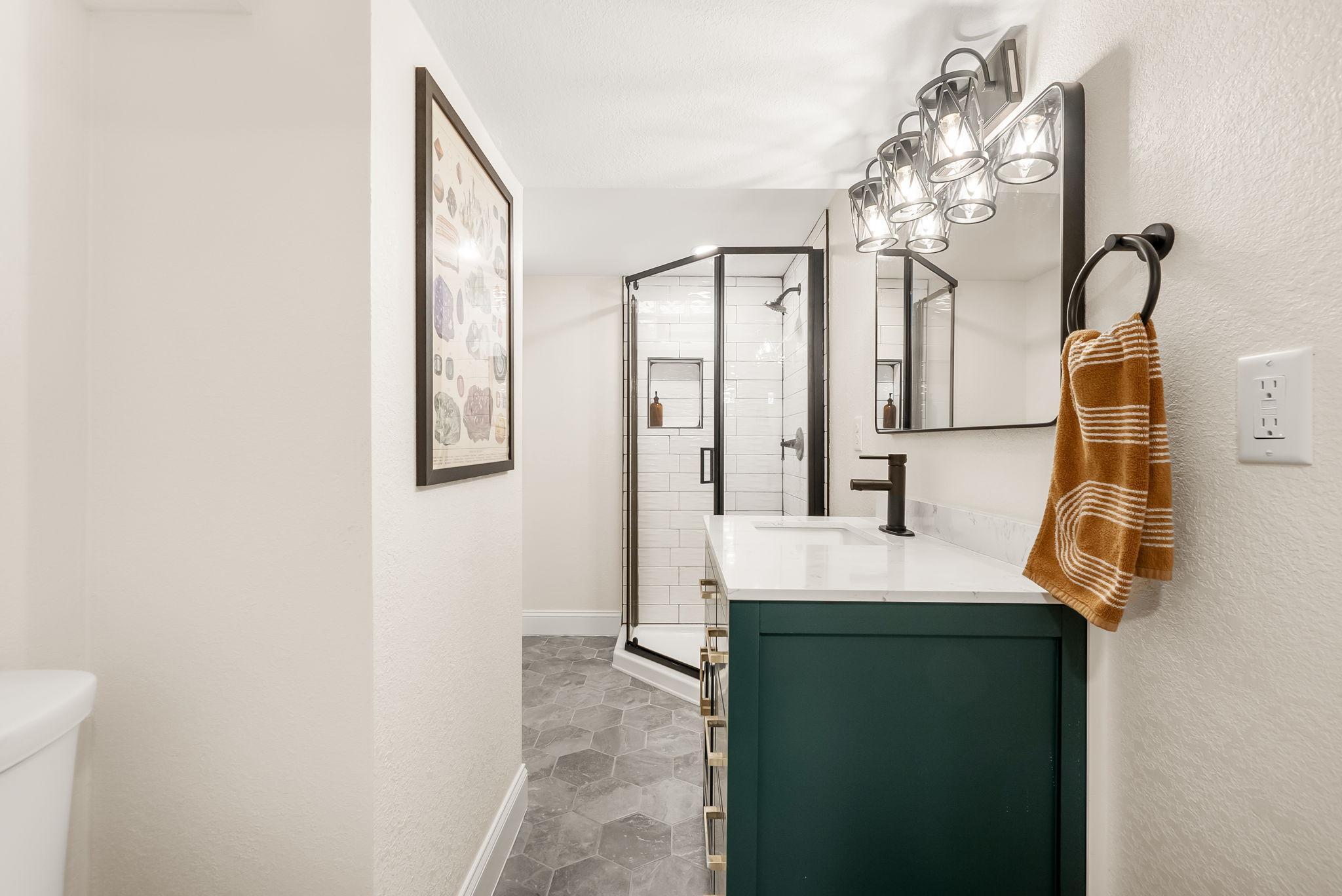 Basement bathroom was installed by licensed contractors in 2024.