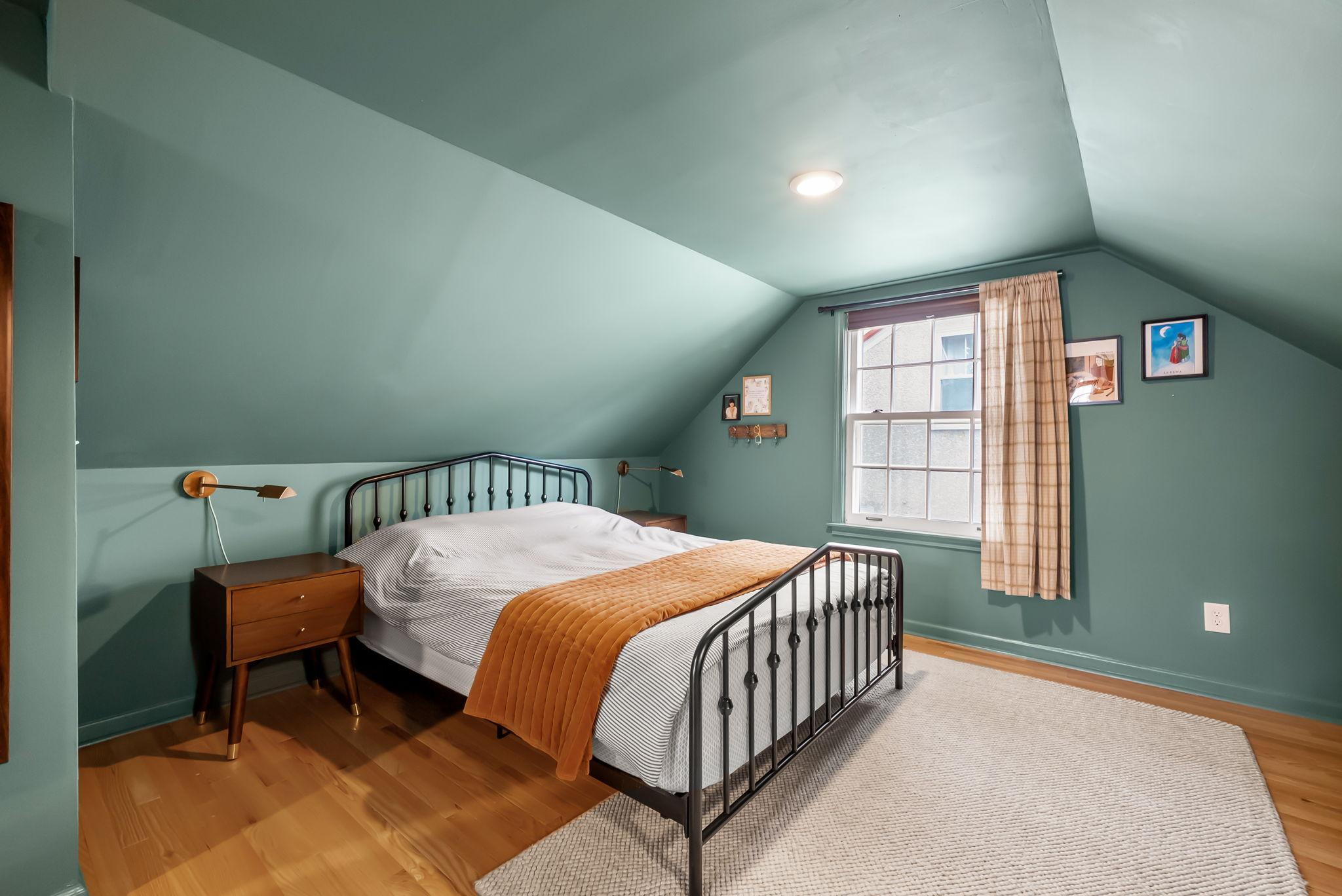 Upstairs is the primary suite, complete with a walk-in closet and ensuite.