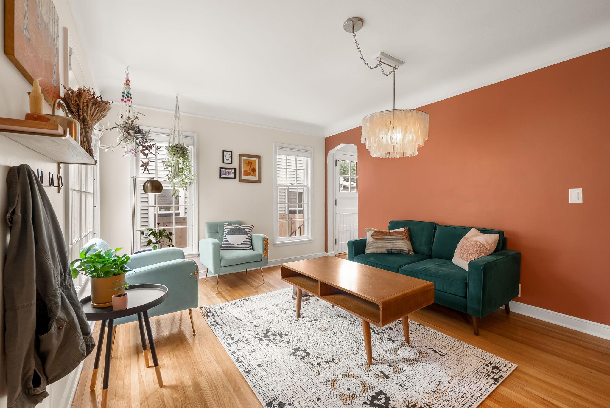 Once inside you're greeted with large windows and an abundance of original charm.