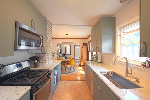 A view of the dining and living room from the kitchen.