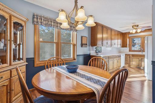 Bright kitchen area with beautiful hardwood floors