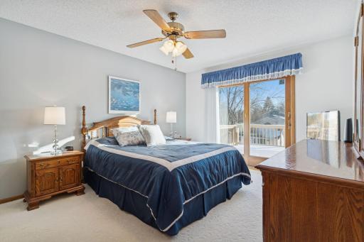 Primary bedroom on main floor with walkout to deck