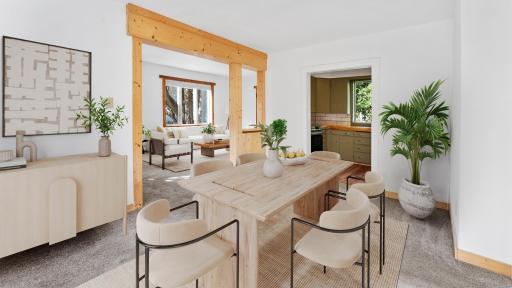 Virtually Staged Dining Room looking into kitchen and living room