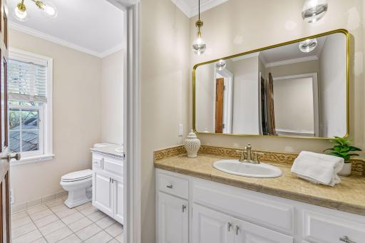 Upper level bathroom with separate wash room