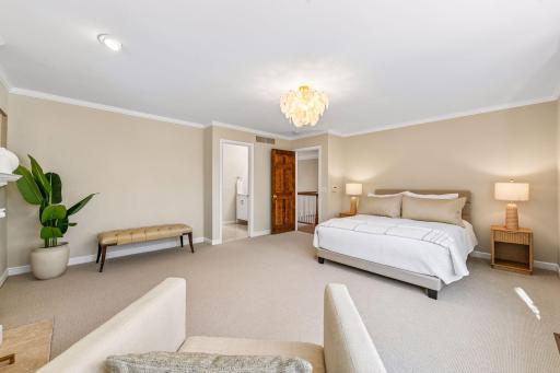 Spacious primary bedroom with private ensuite