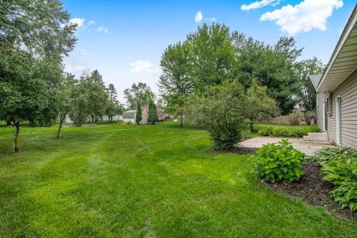 You will love the mature trees that surround the spacious backyard