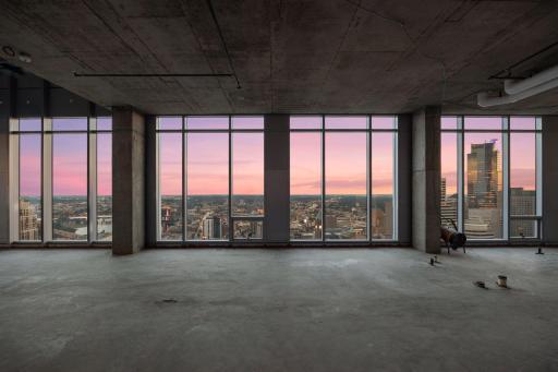 Penthouse sold as raw unbuilt space w/18' ceilings & panoramic views.