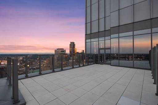 Private 894 sqft glass-enclosed outdoor terrace.