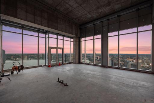 Penthouse sold as raw unbuilt space w/18' ceilings & panoramic views.