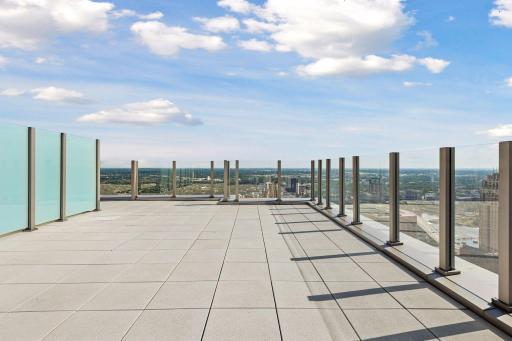 Private 894 sqft glass-enclosed outdoor terrace.