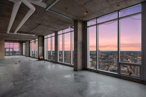 Penthouse sold as raw unbuilt space w/18' ceilings & panoramic views.