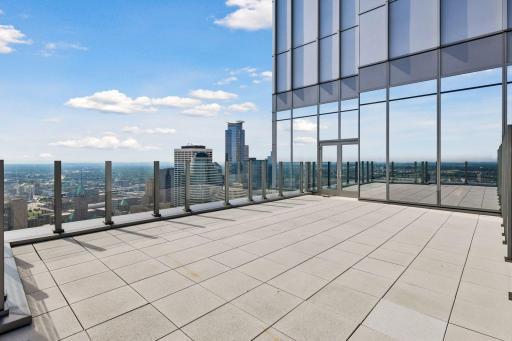 Private 894 sqft glass-enclosed outdoor terrace.