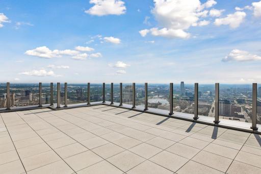 Private 894 sqft glass-enclosed outdoor terrace.