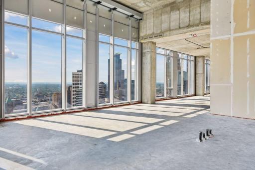 Penthouse sold as raw unbuilt space w/18' ceilings & panoramic views.