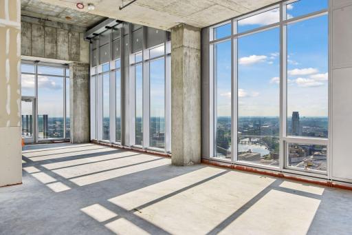 Penthouse sold as raw unbuilt space w/18' ceilings & panoramic views.