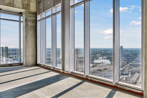 Penthouse sold as raw unbuilt space w/18' ceilings & panoramic views.