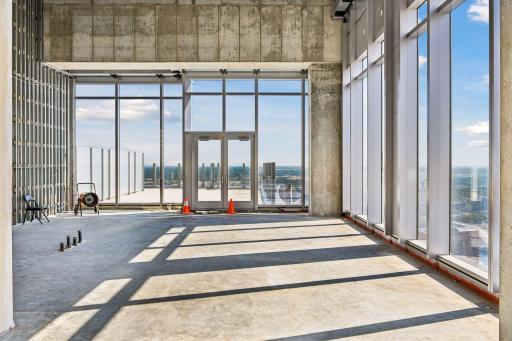 Penthouse sold as raw unbuilt space w/18' ceilings & panoramic views.