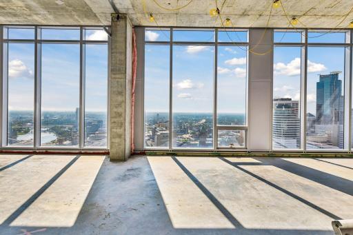 Penthouse sold as raw unbuilt space w/18' ceilings & panoramic views.
