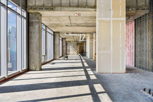 Penthouse sold as raw unbuilt space w/18' ceilings & panoramic views.