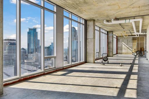 Penthouse sold as raw unbuilt space w/18' ceilings & panoramic views.