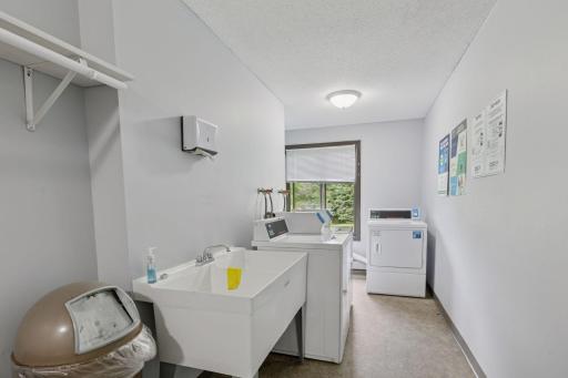 Laundry Conveniently Located Across The Hallway
