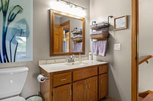 The upper level includes a full bathroom.