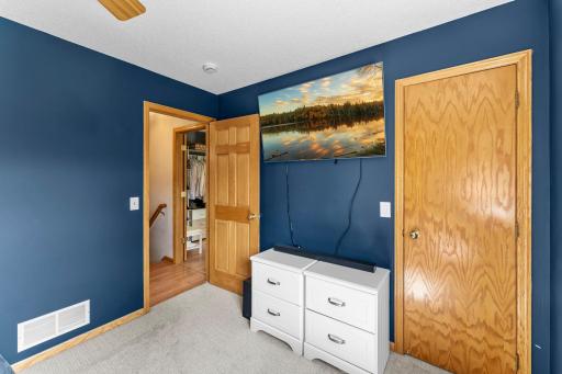 The primary bedroom includes a walk-in closet and a walk-through bathroom.