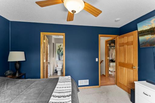 The primary bedroom includes a walk-in closet and a walk-through bathroom.