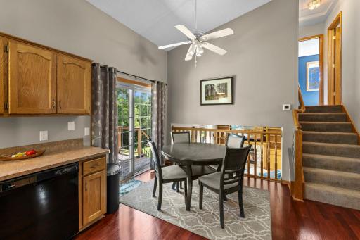 The dining area includes access to the deck.
