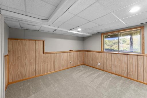 The lower level includes a fourth bedroom.