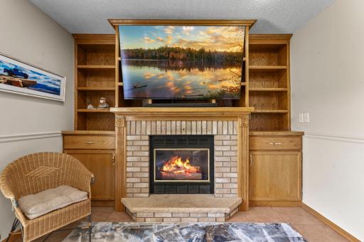 The family room is centered around a beautiful gas fireplace.