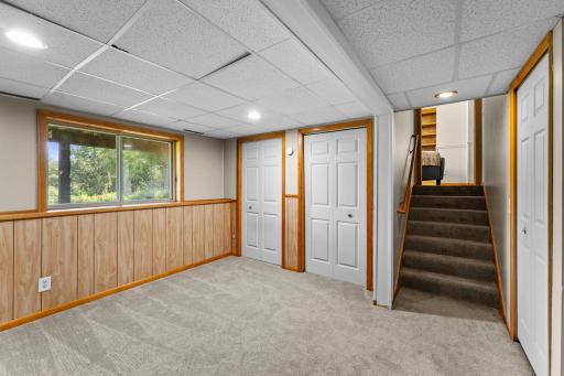 The lower level includes a fourth bedroom.