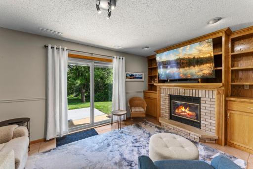 The family room is centered around a beautiful gas fireplace.