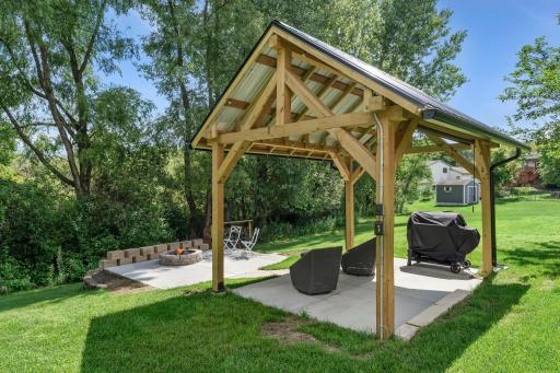 The pergola is a great spot to enjoy some time in the shade.