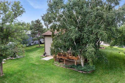 This quiet neighborhood is marked with mature trees, offering both shade and privacy.
