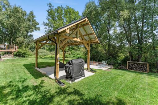The pergola is a great spot to enjoy some time in the shade.