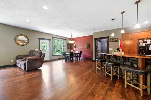 Living room towards kitchen and dining room