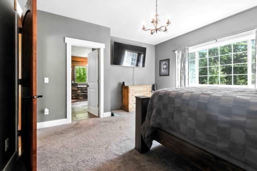 Main floor bedroom towards full bathroom